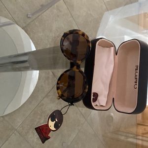 MEGUMI-O tortoiseshell sunglasses with case and cloth.